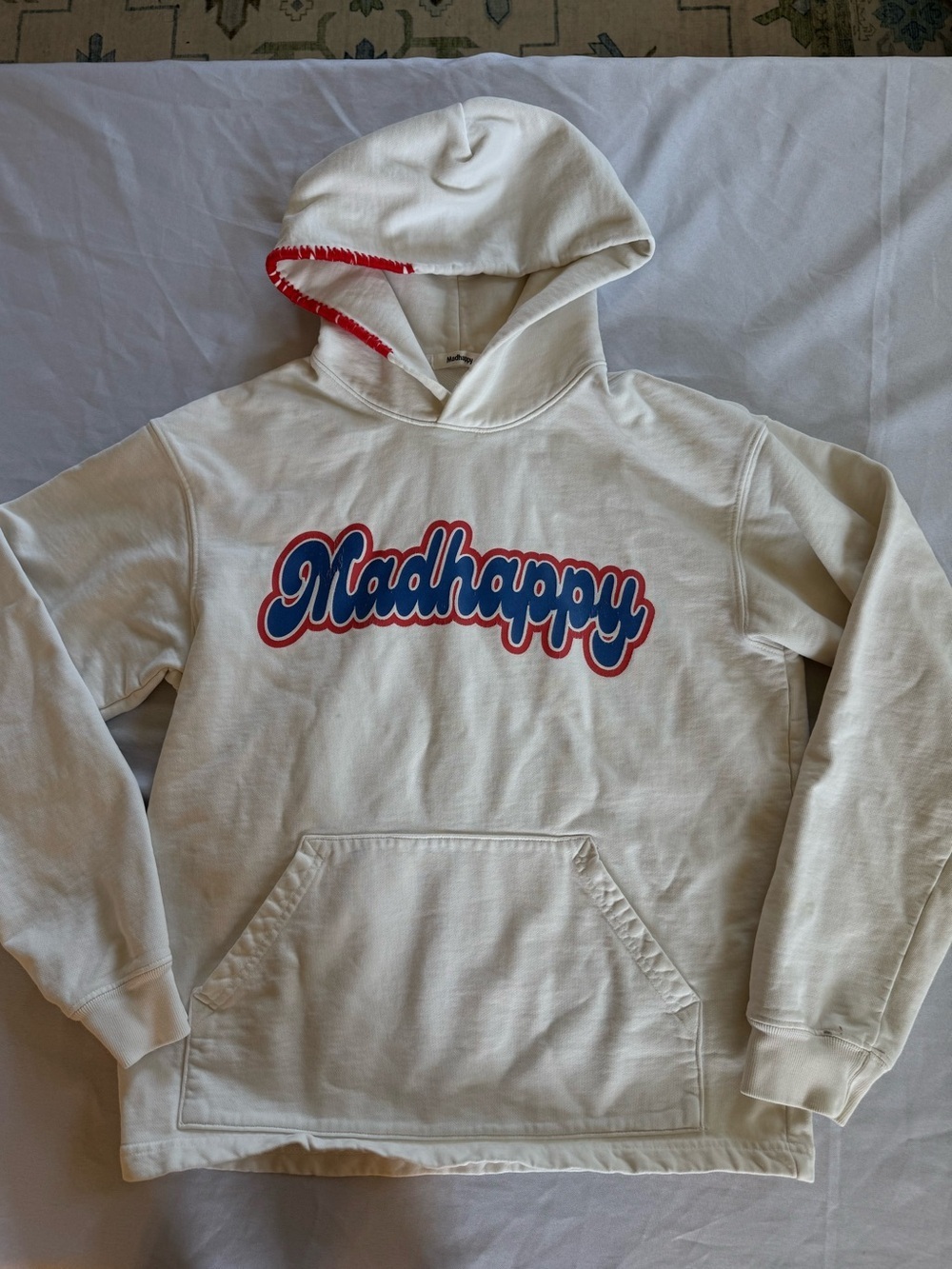 Madhappy Cream Hoodie with Blue and Red Logo and stitching